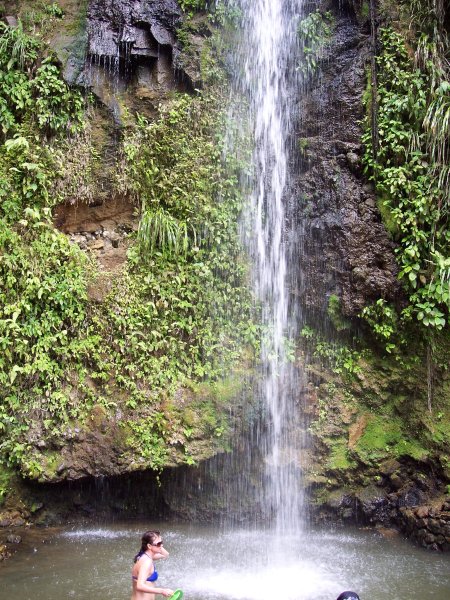 Getting under the waterfall near Soufrieres